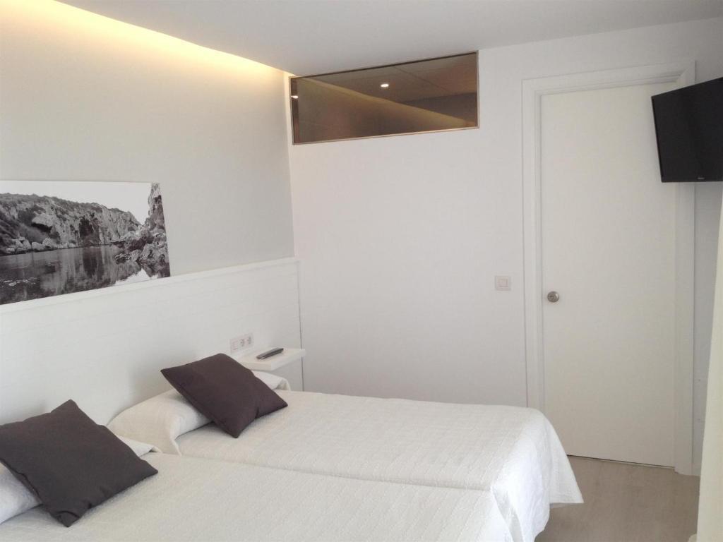 Hostal La Palma Fornells  Rum bild